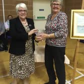 Anne Ramsay of Aghadowey WI being presented with the Jubilee Rose Bowl by Helen Jamieson