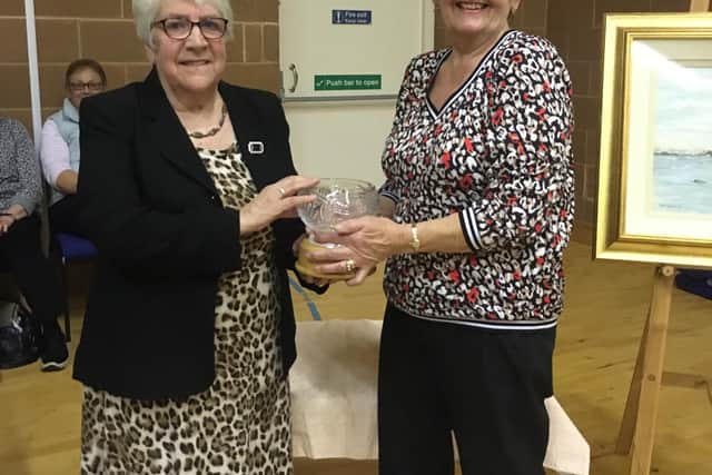 Anne Ramsay of Aghadowey WI being presented with the Jubilee Rose Bowl by Helen Jamieson