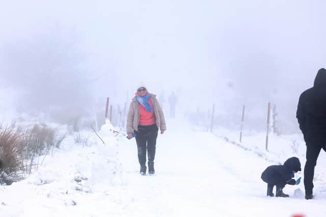 Members of the public pictured on Divis Mountain on the outskirts of west Belfast. Picture: Jonathan Porter / PressEye