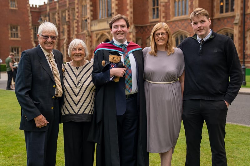 John Logan from Glasgow celebrates with family as he graduates from Queen's University Belfast with a degree in Criminology and Criminal Justice.