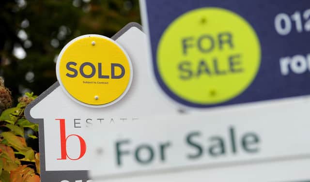 File photo dated 14/10/14 of estate agents boards, as average UK house prices increased by 1.9% in the 12 months to May 2023, slowing from 3.2% in April, according to official figures. The average UK house price was £286,000 in May 2023, which is £6,000 higher than 12 months earlier but £7,000 below a recent peak in September 2022, the Office for National Statistics said.