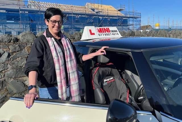 Driving instructor Donna McElherron says driving test appointments are “few and far between.”