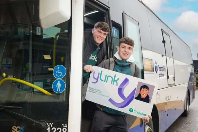Students Charlie McNally and Ross McGuire use their yLink card to travel to university.
