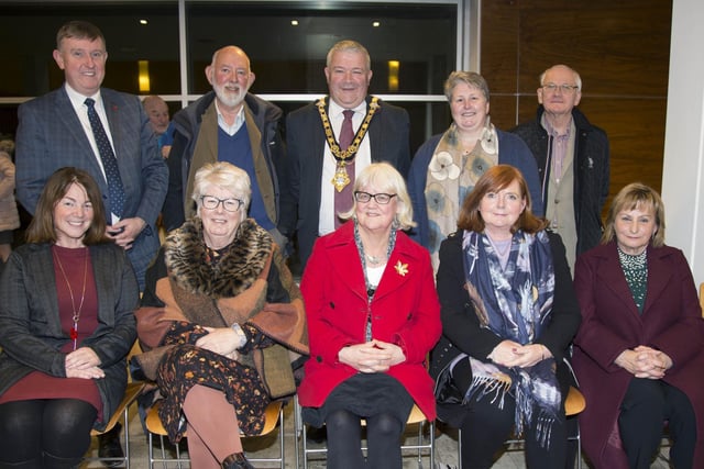 The Mayor of Causeway Coast and Glens Borough Council Councillor Ivor Wallace pictured with some of those from Ballycastle Foodbank who attended the event in Cloonavin to recognise the work of local Food Banks and Christians Against Poverty, along with Councillor Mervyn Storey
