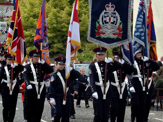 Ballyrea Boyne Defenders Flute Band standard bearers on the march at the RBP Last Saturday parade in Loughgall. TH32.
