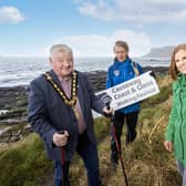 Mayor of Causeway Coast and Glens, Councillor Steven Callaghan launches the Walking Festival 2024 alongside Kerrie McGonigle, Council’s Destination Tourism Manager, and Lawrence McBride, Director of Far and Wild. Credit McAuley Multimedia