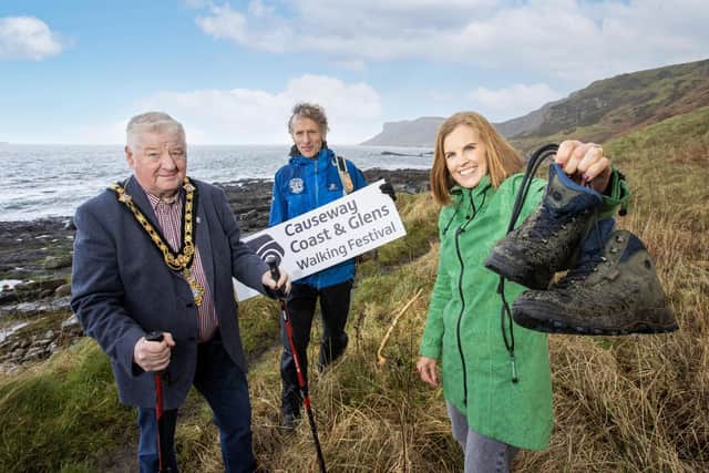 Mayor of Causeway Coast and Glens, Councillor Steven Callaghan launches the Walking Festival 2024 alongside Kerrie McGonigle, Council’s Destination Tourism Manager, and Lawrence McBride, Director of Far and Wild. Credit McAuley Multimedia