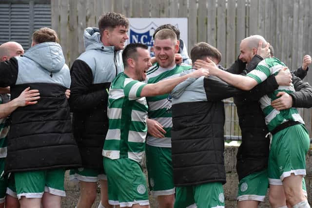 Cleary Celtic players celebrate with second goal scorer Stephen Quinn (far right) at the Showgrounds. Pic: Brendan Monaghan