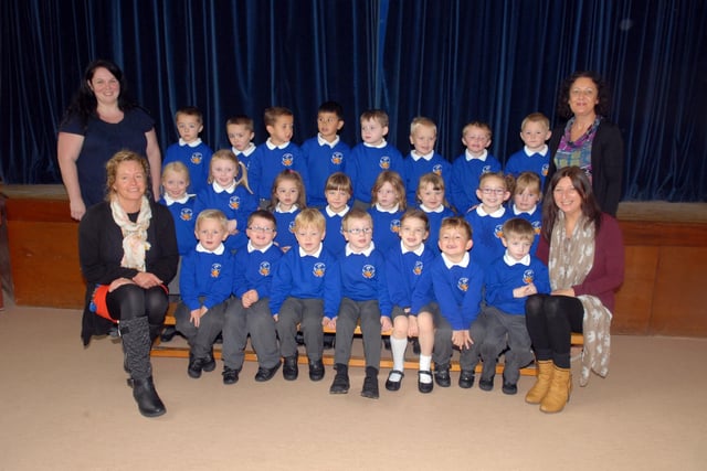 Knockmore Primary School P1 pupils with teachers Mrs Pamela Jones and Miss Joan Davidson and classroom assistants Mrs Sharon Johnston and Miss Ellie Sterling in 2013