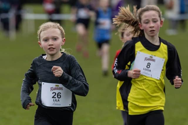 Lila McManus from Omagh Integrated Primary first to cross the finish line followed by Lucia in 2nd.