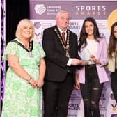 U15 Ruairí Óg Camogie Team won the 2023 Merit Award. Representatives from the team are pictured with Denise Watson, Mayor Councillor Steven Callaghan and Deputy Mayor, Councillor Margaret-Anne McKillop.