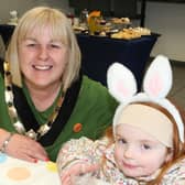 Pictured at the RNLI Coffee morning in Cushendall are Deputy Mayor Cllr Margaret-Anne McKillop and a little Easter bunny guest.
