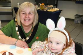 Pictured at the RNLI Coffee morning in Cushendall are Deputy Mayor Cllr Margaret-Anne McKillop and a little Easter bunny guest.