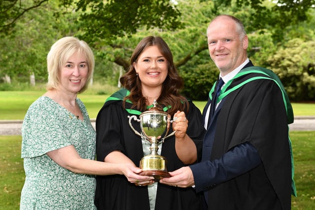 Rachel McIntyre from Coleraine was presented with the Collette O’Neill Memorial Cup recognising her contribution to student life at Loughry Campus during the past academic year. Congratulating Rachel on her active involvement in Loughry life is Judith Mullan (Student Services, Loughry Campus) and Fintan McCann (Head of Food Education, CAFRE). Rachel graduated with a First Class Honours Degree in Food Business Management at CAFRE’s Higher Education Graduation Ceremony.