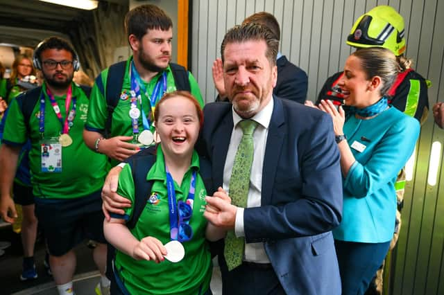 Déarbháile Savage, a member of Newry All Stars Special Olympics Club, from Mowhan, Co Armagh, is greeted by Matt English, CEO of Special Olympics Ireland, at Dublin Airport on the team's return from the World Special Olympic Games in Berlin, Germany. Photo by Ray McManus/Sportsfile