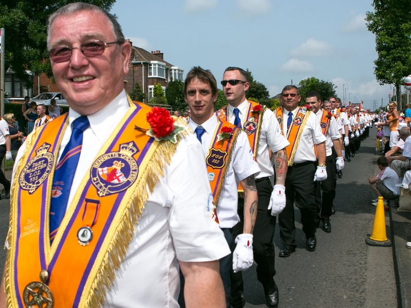 Tommy Campbell from Bennetts Chosen Few LOL 553 marching in Glengormley on the Twelfth. INCT 29-433-RM
