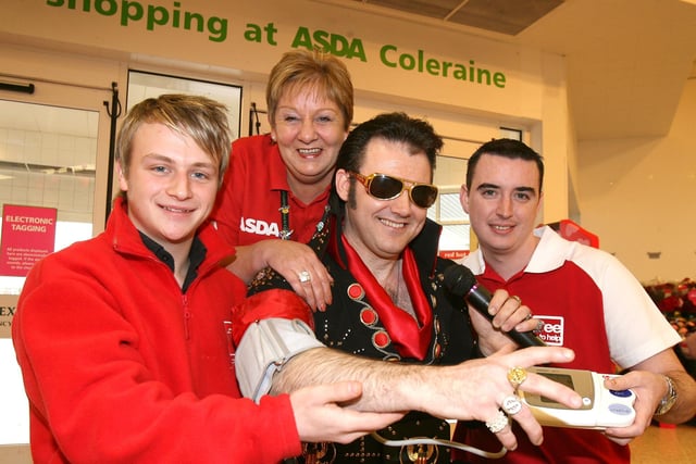 THAT'S ALL RIGHT...James Harris and Andrew McCloskey from Fitness First check Elvis' blood pressure when he visited the ASDA store in Coleraine to celebrate Valentine's Day in 2007. Included is Sylvia Ridgill of ASDA.