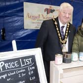 Mayor of Causeway Coast and Glens, Councillor Steven Callaghan with Lynne Rainey of Angel Wood Candles and Catrina McNeill, Council’s Town Project officer.