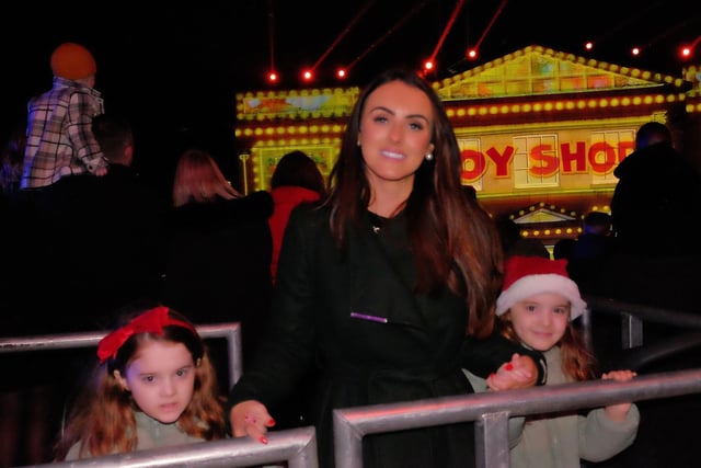 Lord Mayor of Armagh Sarah Duffy and Emily and Lucia enjoy the festive lightshow at Armagh Georgian Festival.