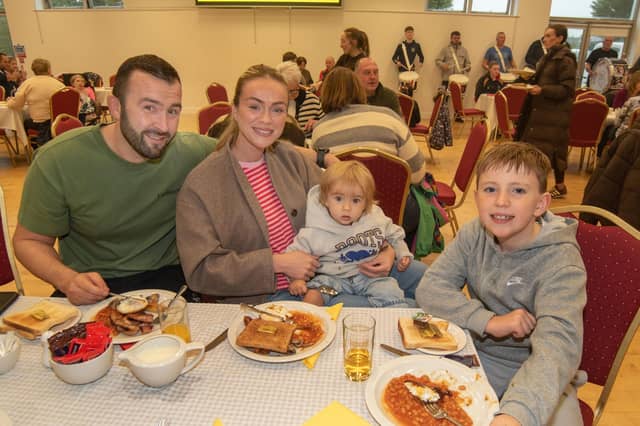 Enjoying their big breakfasts are members of the Graham family including, dad, William, mum, Nicole, George (1) and David (9).