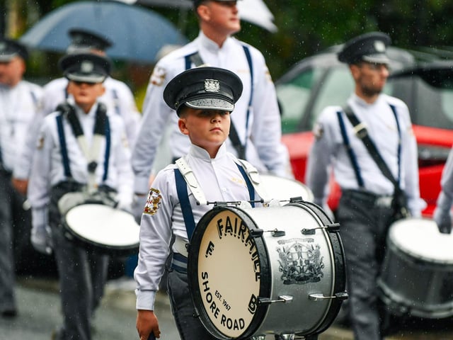 Taking part in the 'Last Saturday' parade.