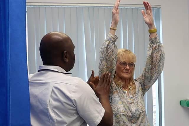 Jill Johnston with South Eastern Trust Physiotherapist Emoefe Diemeta. Pic credit: SEHSCT