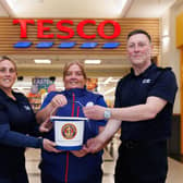 (L-R) Kerry Whitehouse, CRS Antrim District Unit Commander and Fundraiser Officer, Donna McCotter, Community Champion at the Tesco Yorkgate store in Belfast, and Dominic McIlroy, CSR Belfast District Unit Commander. CREDIT BRENDAN GALLAGHER