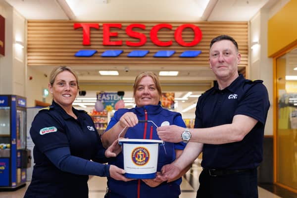 (L-R) Kerry Whitehouse, CRS Antrim District Unit Commander and Fundraiser Officer, Donna McCotter, Community Champion at the Tesco Yorkgate store in Belfast, and Dominic McIlroy, CSR Belfast District Unit Commander. CREDIT BRENDAN GALLAGHER