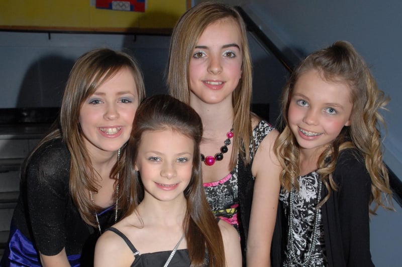Ellen Cross, Emma Jones, Abigaile Adamson and Shannon McNeill in New Look outfits for the fashion show  for Larne Grammar School hockey funds in 2009. LT49-335-PR