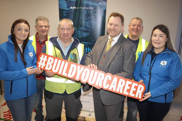 Helping students to consider ‘Build Your Career’ a future in construction from Henry Brothers, were, from left: (back) Keith McCulloch, Keith Kitchen, (front) Danielle Darragh, John Cunnigham, Barry Neilson OBE CITB NI, Shannon McGilligan. Picture: Peter O'Hara Photography