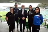 Communities Minister Gordon Lyons is pictured with local club representatives as he gives approval to the Northern Ireland Football Fund. Photo supplied by Department for Communities.