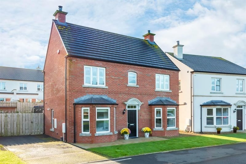 The property has a handsome red brick exterior.