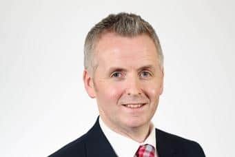 DUP Alderman John McAuley asked  if council were being “told” to implement the plan by the Home Office.