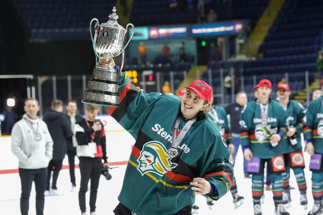 Belfast Giants’ Jackson Whistle celebrates with the Playoff Trophy after defeating the Cardiff Devils to win Sunday’s Elite Ice Hockey League Playoff Final at the Motorpoint Arena, Nottingham. Photo by William Cherry/Presseye