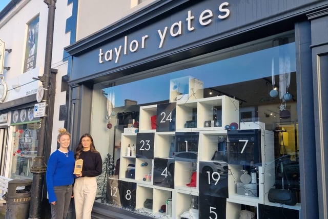 The judges awarded Taylor Yates best window for Bushmills and were particularly impressed that their advent calendar offered shoppers something special every day during December. Pictured with the trophy are Ellen Yates and Aine Donnelly.