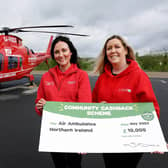Kerry Anderson, Head of Fundraising from Air Ambulance NI is pictured with Bronagh Luke from SPAR NI to receive a cheque for £10,000 as part of SPAR’s Community Cashback Grant Funding for 2023