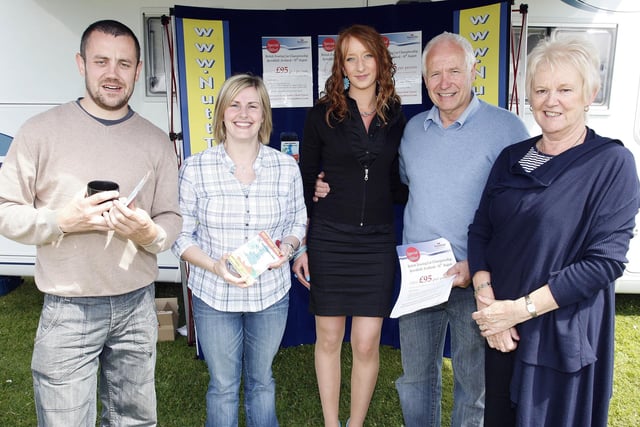 FAMILY AFFAIR...Billy, Isobel and Marty Nutt and Louise Smyth from Nutt Travel pictured with Paula Cassidy during the Ford Fair at the Dunluce Centre in 2009.