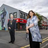 Department for Communities Officer Rhonda Williamson, Mayor of Causeway Coast and Glens Councillor Steven Callaghan and local artist Michelle McGarvey as they admire Coleraine’s town centre artworks.