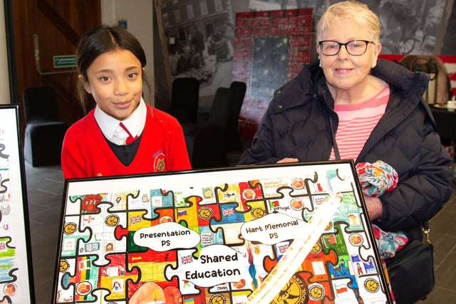 Presentation PS pupil Michelle Goncalves and board of govenors member, Nuala Molloy pictured at the Hart and Presentation Primary Schools Shared Education celebration at Millennium Court. PT18-236.