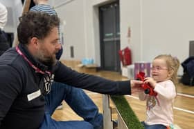 Mark Fullerton, Engineering Lecturer, SERC, gives young participant Eimear a helping hand with friction and inclines at SERC’s We Can Engineer It workshop for young girls to raise awareness of engineering as an option and help develop STEM skills.