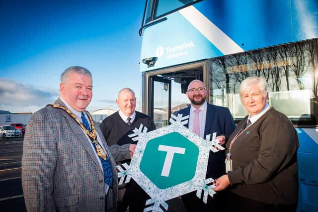 Mayor of Causeway Coast And Glens Borough Council, Councillor Ivor Wallace, with Translink’s Mark Dunn, Mark Montgomery and Margaret Campbell launching their Christmas travel offers