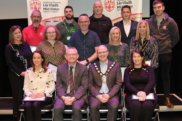 Pictured with the Chair of the Council, Councillor Dominic Molloy and Chief Executive, Adrian McCreesh are members of staff from Mid Ulster District Council who received an award for completing a course or qualification.