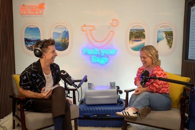 Russell Kane shares a laugh with Ellie Simmonds as they talk travel on Pack Your Bags podcast