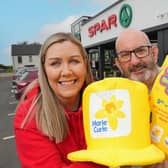 Bronagh Luke from SPAR NI is pictured with Conor O’Kane from Marie Curie to launch the Blooming Great Summer Fundraiser.