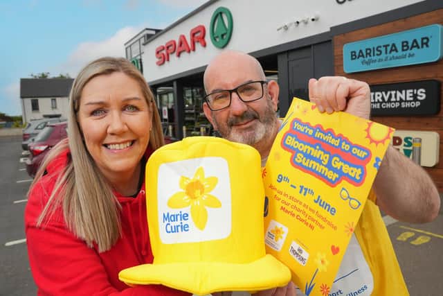 Bronagh Luke from SPAR NI is pictured with Conor O’Kane from Marie Curie to launch the Blooming Great Summer Fundraiser.