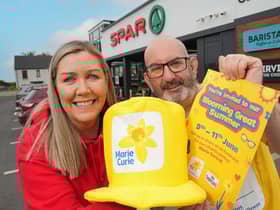 Bronagh Luke from SPAR NI is pictured with Conor O’Kane from Marie Curie to launch the Blooming Great Summer Fundraiser.