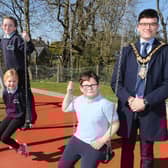 Pictured at the official opening of the reinstated play park at Scally Park in Loughguile are Mayor of Causeway Coast and Glens, Councillor Ciarán McQuillan and children from local primary schools.