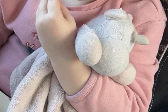 Orla's auntie gave her the beloved comforter when she was born and Orla has remained attached to it ever since. A close-up of the unicorn comforter which is pale in colour. Photograph contributed by Shannon Day