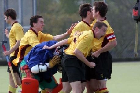 Players celebrate after winning the title.