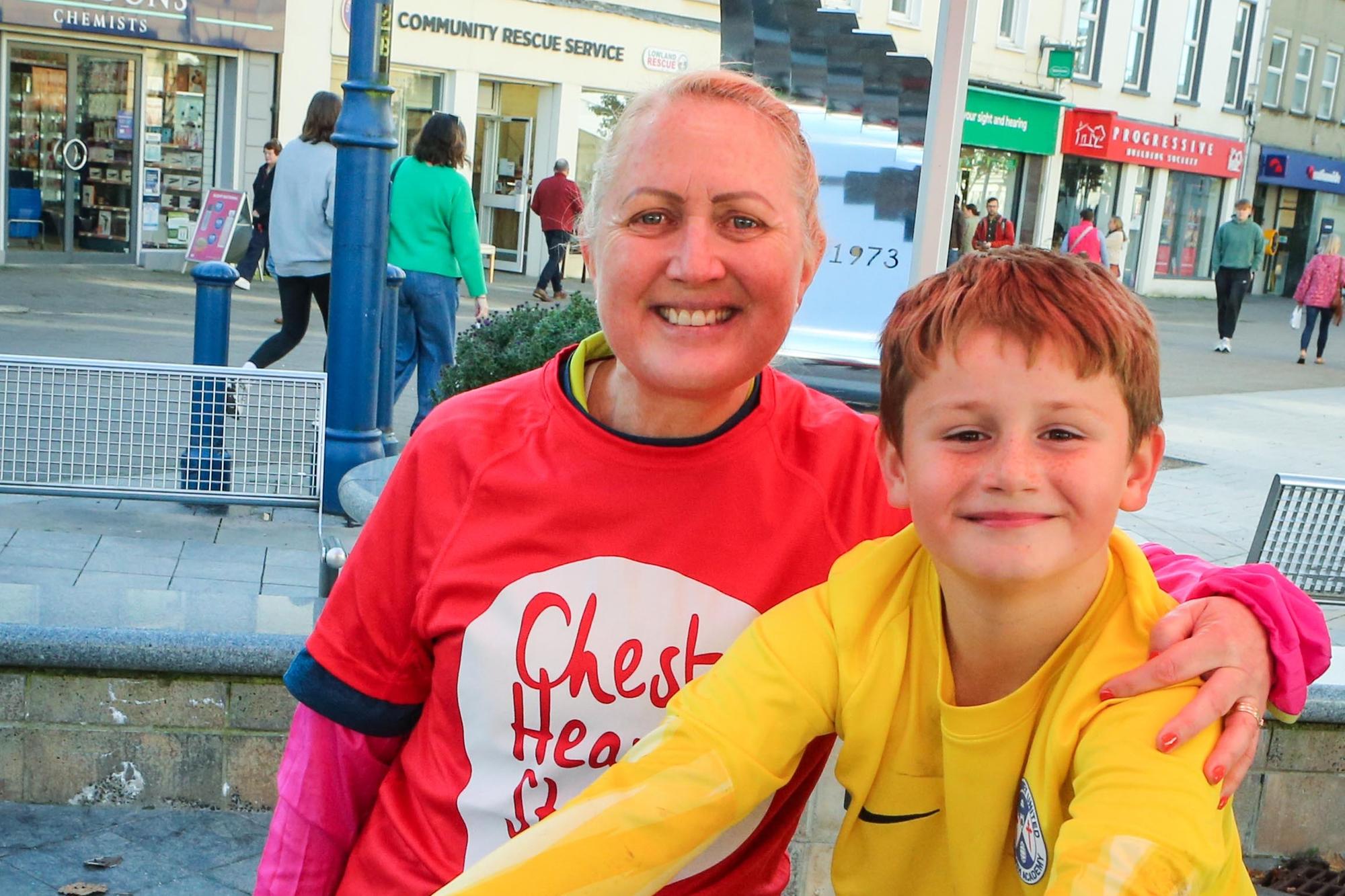 Finn McCloskey with Mayor of Causeway Coast and Glens, Councillor Dawn Huggins